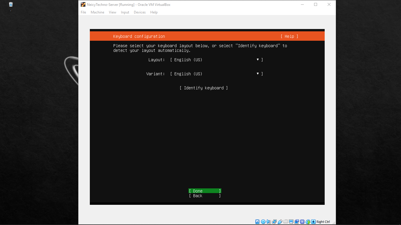 memilih jenis keyboard yang digunakan virtualbox